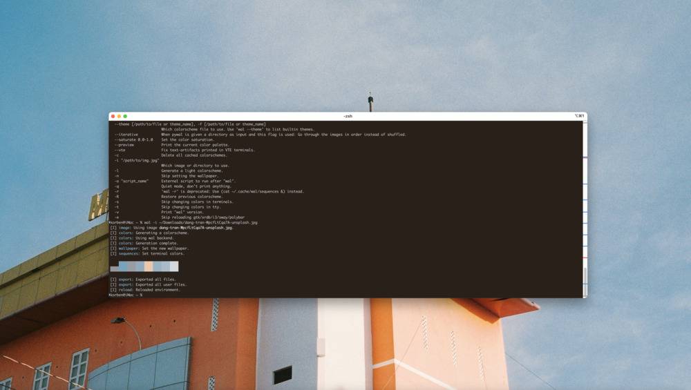 Capture d'écran d'un système d'exploitation avec une barre de menu personnalisée en bleu foncé et un fond d'écran étoilé